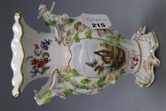 A late 19th century English bone china double handled vase, encrusted with flowers and having frilled rim heightened in gilt, topograph